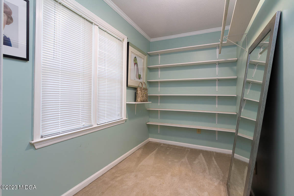 173 Old Ridge Road Macon, GA 31211 - Photo 23 of 37 a view of a room with rack on the wall