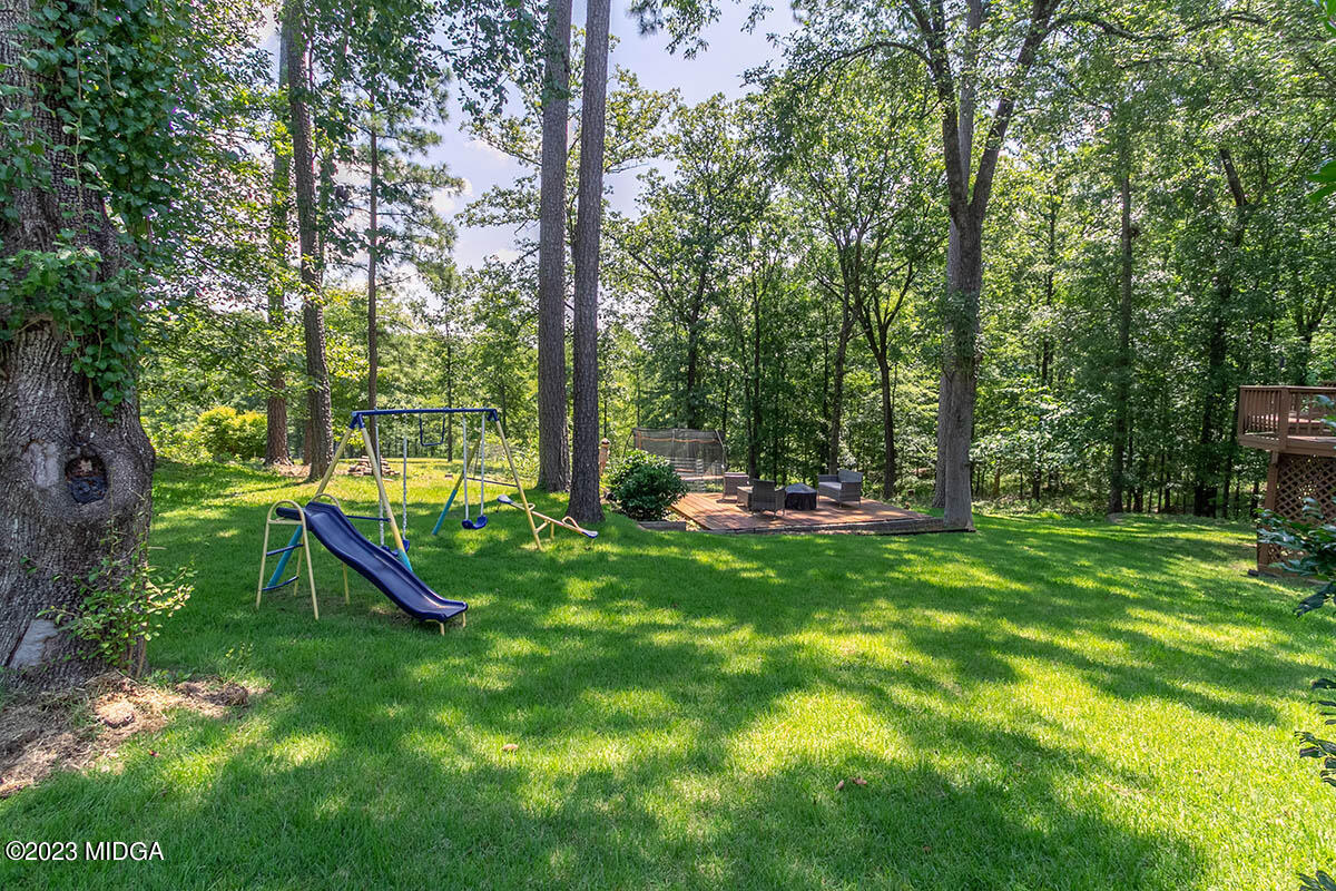 173 Old Ridge Road Macon, GA 31211 - Photo 31 of 37 a view of a park with slide