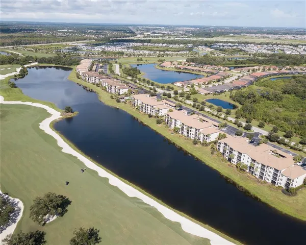a lots of chairs sitting in a room next to a window