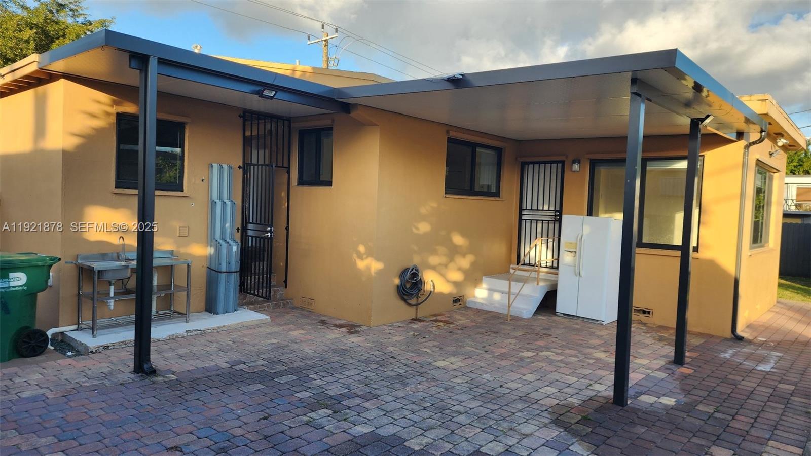 8010 Southwest 16th Street, Unit 8010 Miami, FL 33155 - Photo 27 of 33 a view of a house with a porch