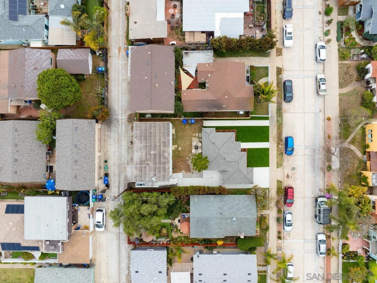 4614-4616 Larkspur Street San Diego, CA 92107 - Photo 12 of 51 aerial view of multiple houses with a yard