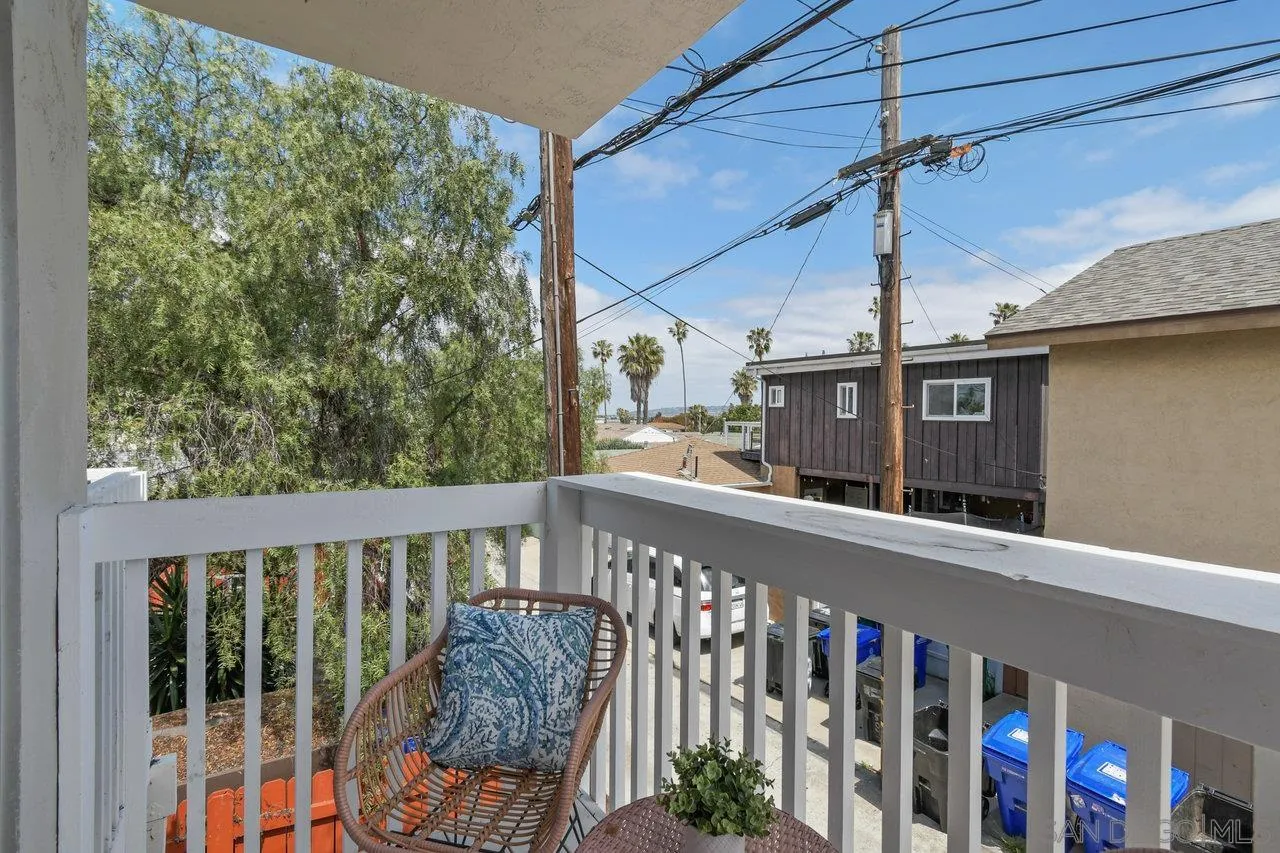 4614-4616 Larkspur Street San Diego, CA 92107 - Photo 14 of 51 a view of a balcony with many windows