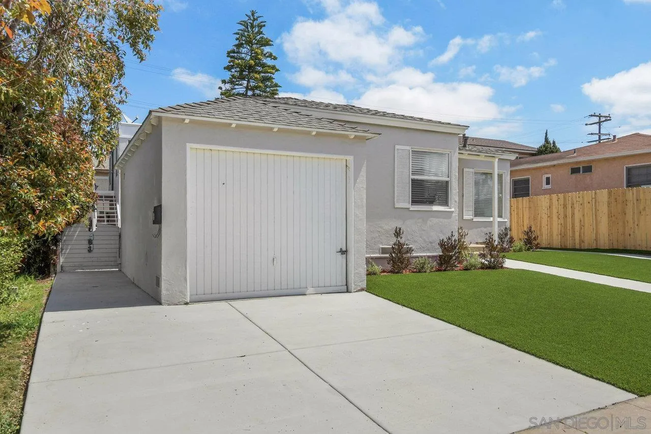 4614-4616 Larkspur Street San Diego, CA 92107 - Photo 32 of 51 a view of a house with a garden
