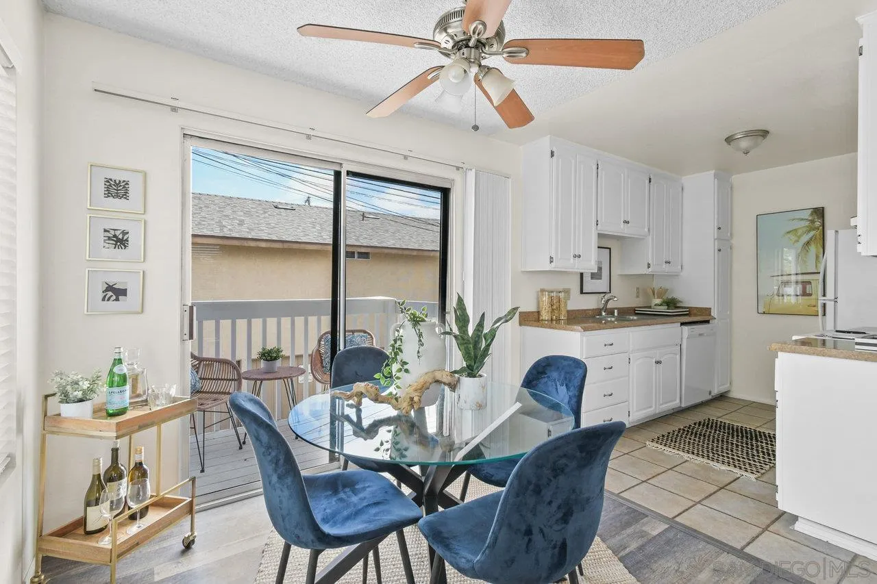 4614-4616 Larkspur Street San Diego, CA 92107 - Photo 33 of 51 a view of a dining room with furniture window and outside view