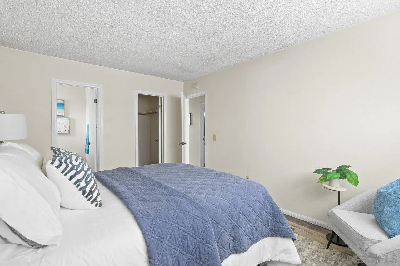 4614-4616 Larkspur Street San Diego, CA 92107 - Photo 42 of 51 a bedroom with a bed and a couch