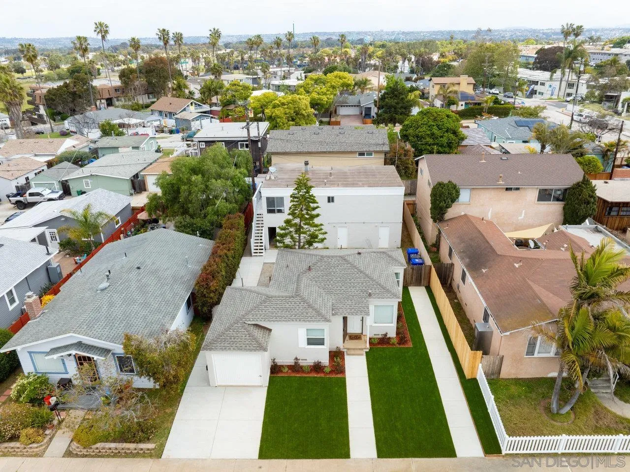 4614-4616 Larkspur Street San Diego, CA 92107 - Photo 43 of 51 an aerial view of residential houses with outdoor space and parking