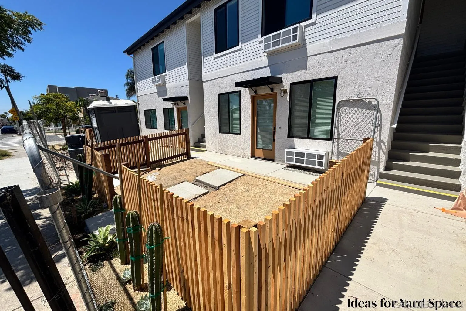 4614-4616 Larkspur Street San Diego, CA 92107 - Photo 49 of 51 a view of a patio with chairs and potted plants