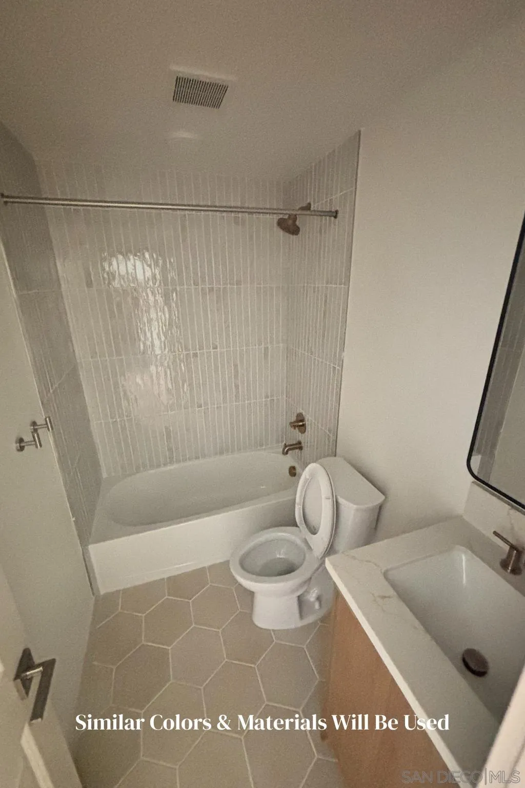4614-4616 Larkspur Street San Diego, CA 92107 - Photo 51 of 51 a bathroom with a tub a sink and toilet