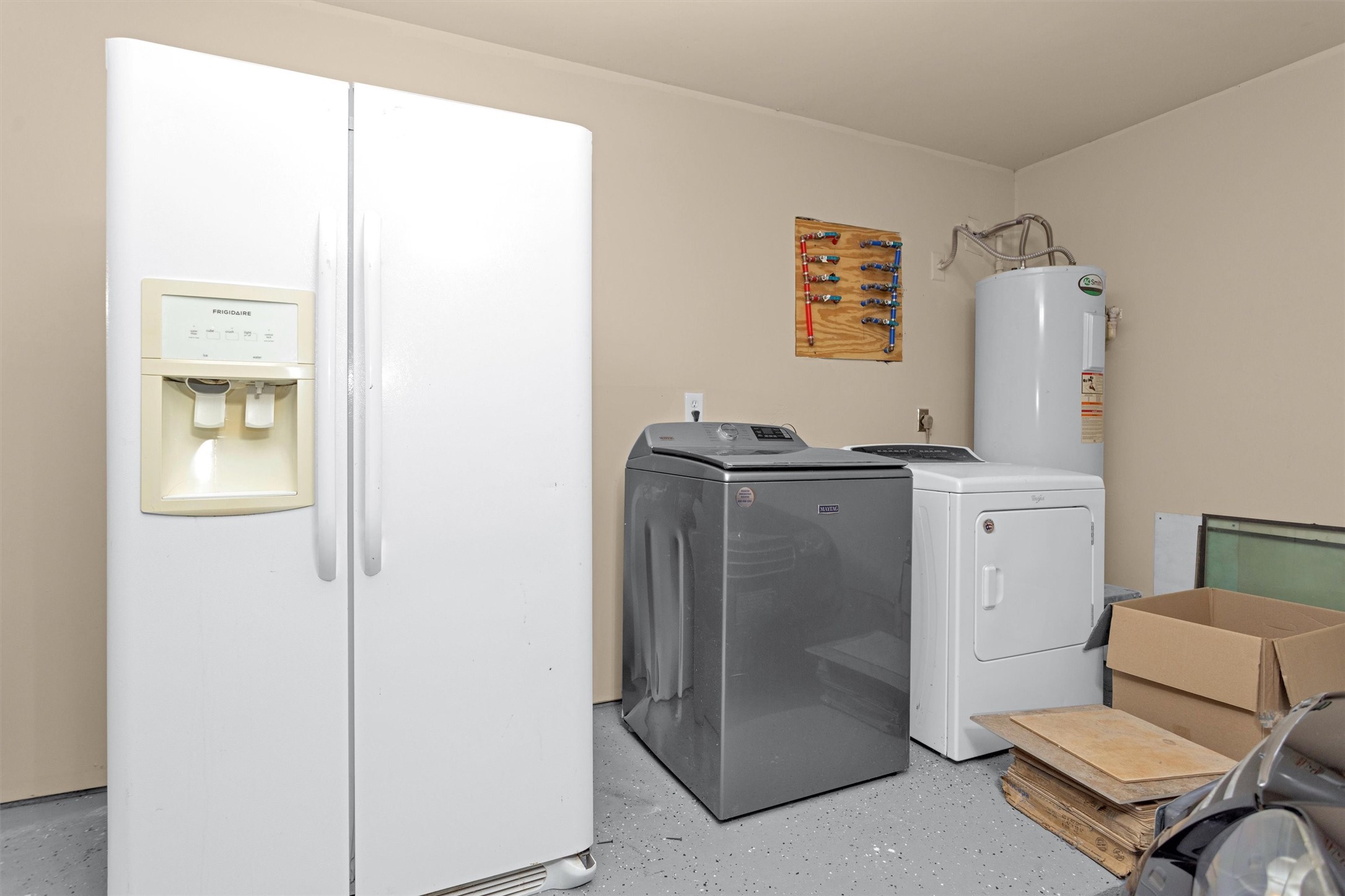 4807 Bridgemont Lane Spring, TX 77388 - Photo 37 of 42 PEX throughout house - valve shut offs on wall.