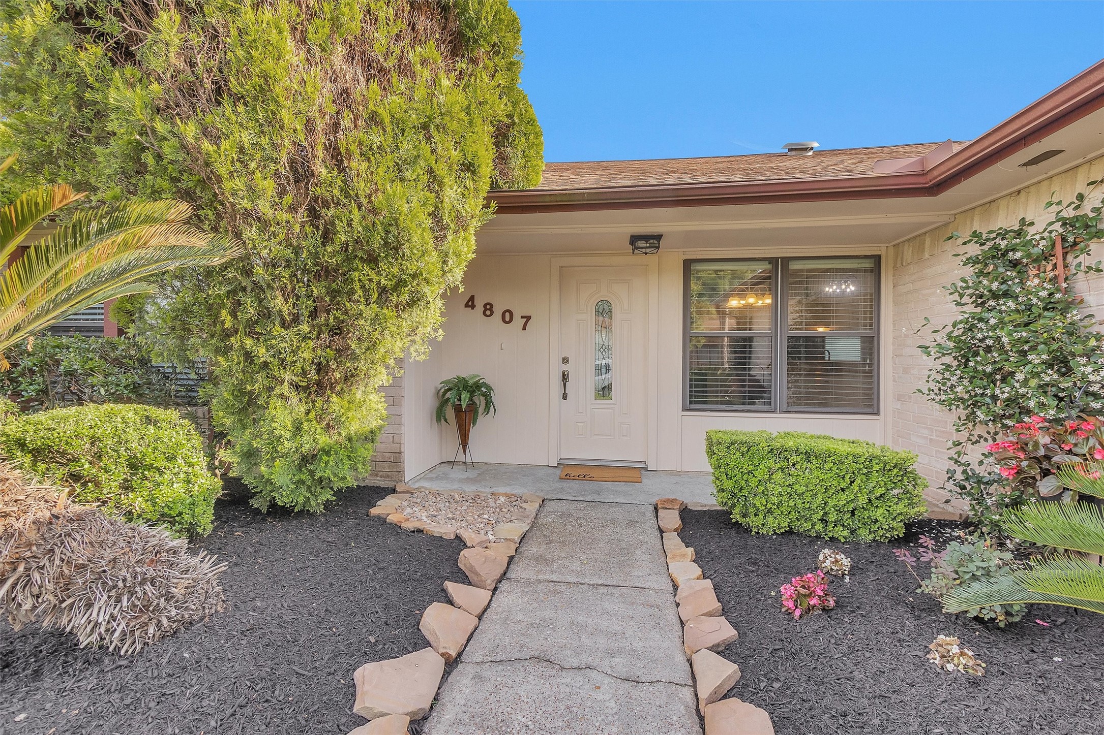 4807 Bridgemont Lane Spring, TX 77388 - Photo 4 of 42 In season, the smell of fragrant jasmine greets you as you approach the front door.