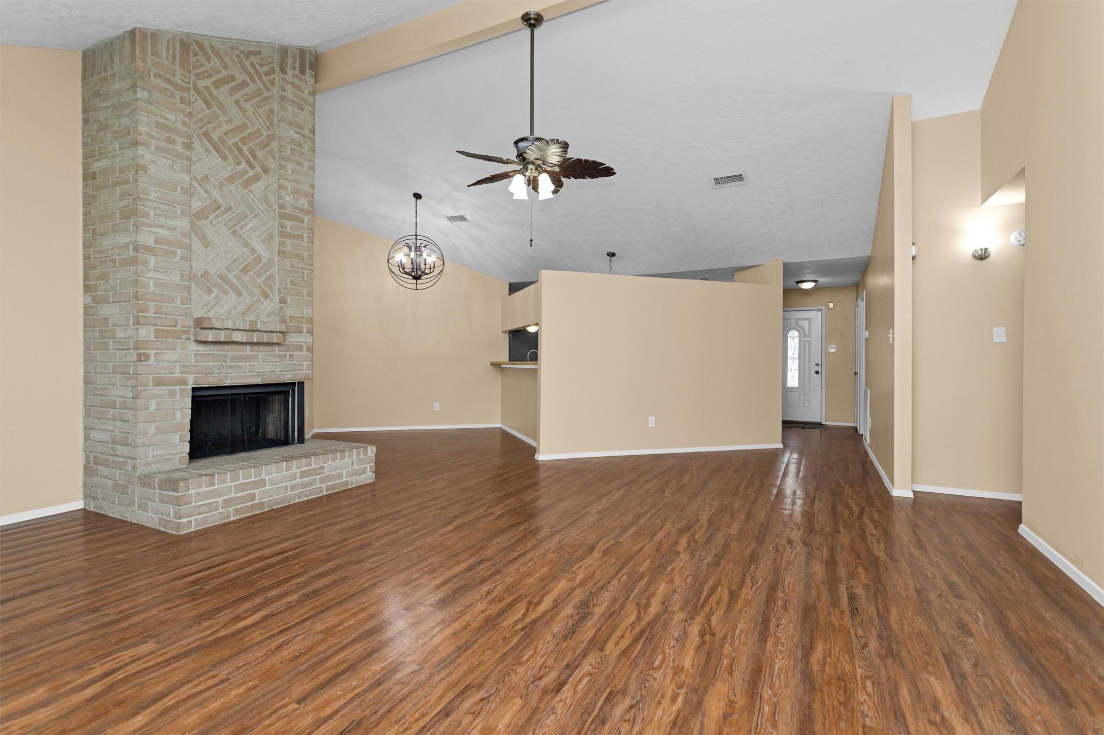 4807 Bridgemont Lane Spring, TX 77388 - Photo 10 of 42 Looking back across family room you can see the formal dining room as well as the updated light fixture.