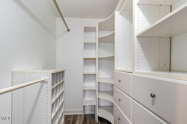 2903 Tavistock Drive Durham, NC 27712 - Photo 16 of 28 a view of walk in closet with empty racks