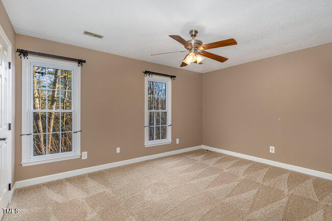 2903 Tavistock Drive Durham, NC 27712 - Photo 20 of 28 a view of an empty room with a window