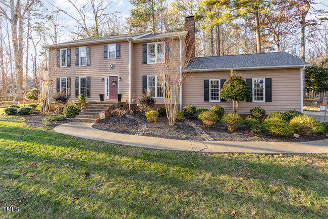 2903 Tavistock Drive Durham, NC 27712 - Photo 2 of 28 a front view of a house with garden