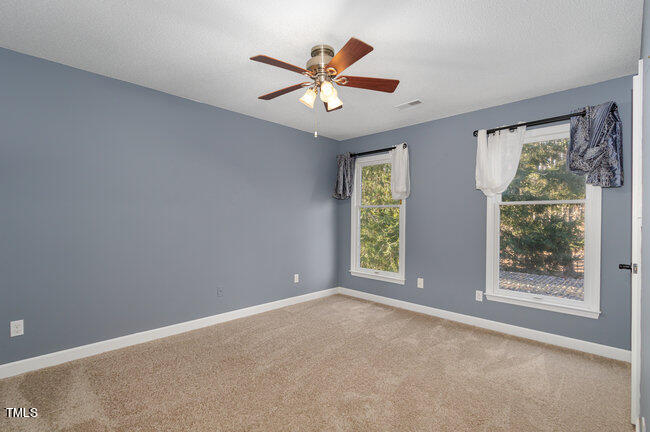2903 Tavistock Drive Durham, NC 27712 - Photo 21 of 28 a view of an empty room with a window