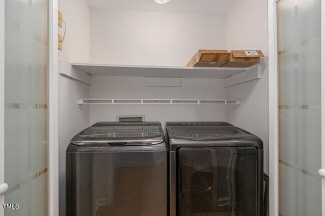 2903 Tavistock Drive Durham, NC 27712 - Photo 23 of 28 a utility room with dryer and washer