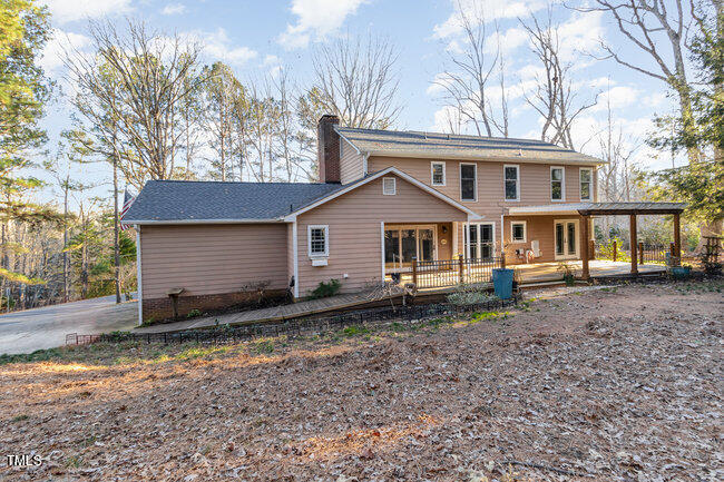 2903 Tavistock Drive Durham, NC 27712 - Photo 26 of 28 a view of a house with a yard