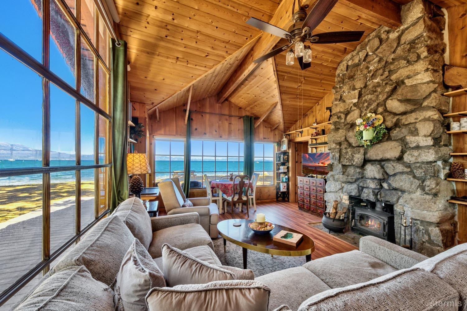 3865 Beach Road South Lake Tahoe, CA 96150 - Photo 15 of 35 a living room with furniture and a floor to ceiling window