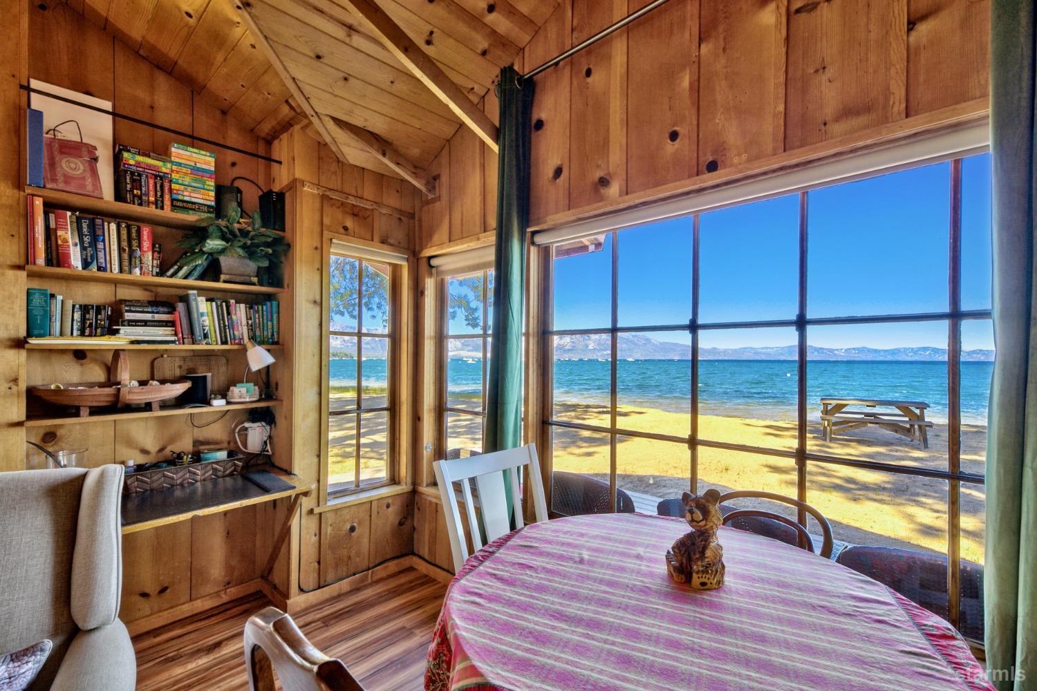 3865 Beach Road South Lake Tahoe, CA 96150 - Photo 18 of 35 a view of a dining room with furniture window and wooden floor