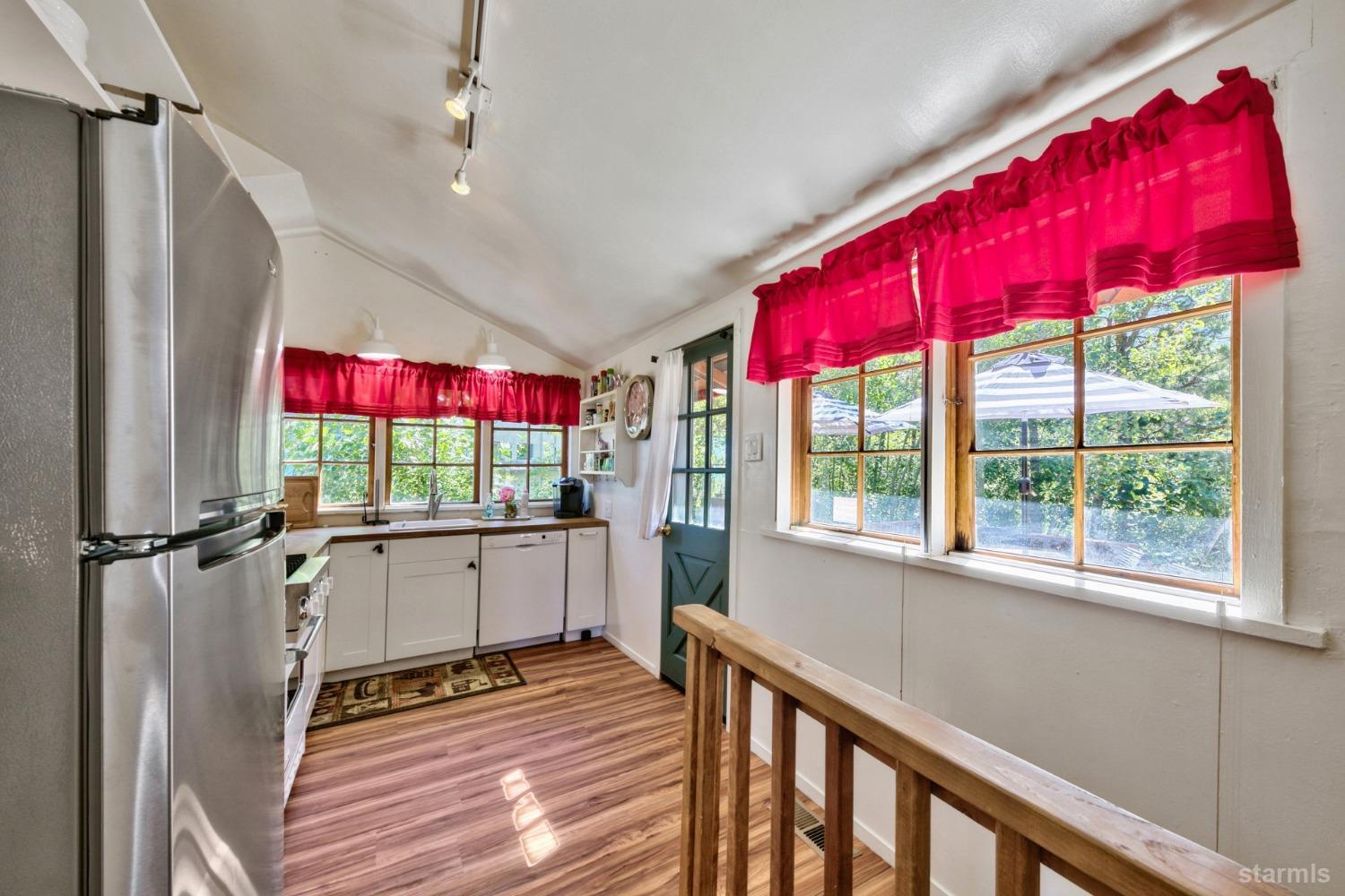 3865 Beach Road South Lake Tahoe, CA 96150 - Photo 23 of 35 a room with window and wooden floor