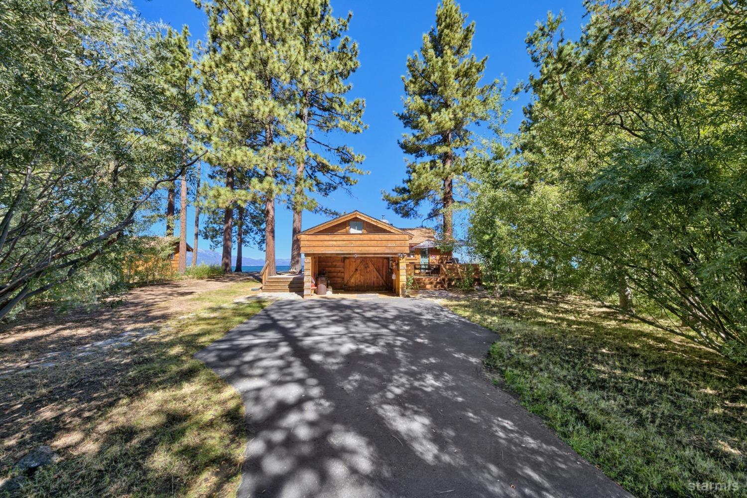 3865 Beach Road South Lake Tahoe, CA 96150 - Photo 4 of 35 a view of a house with a tree
