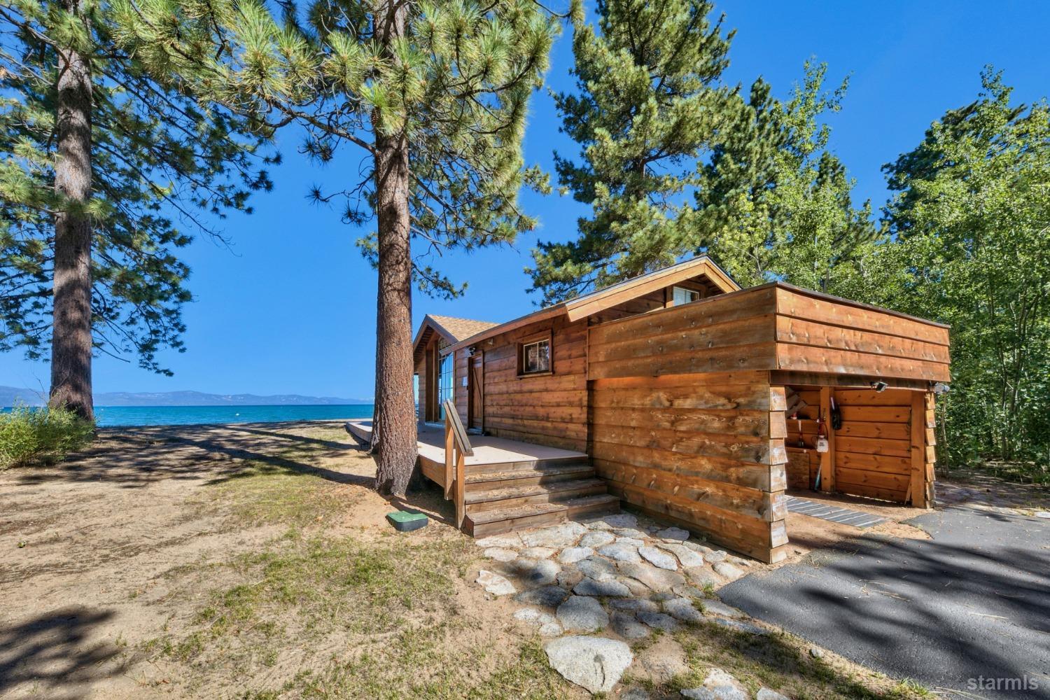 3865 Beach Road South Lake Tahoe, CA 96150 - Photo 6 of 35 a view of a house with a yard