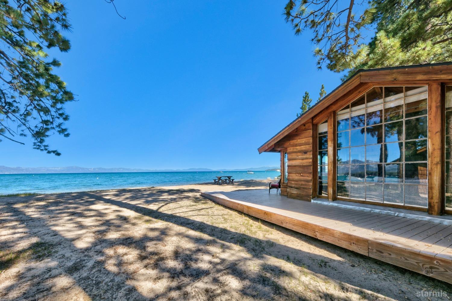 3865 Beach Road South Lake Tahoe, CA 96150 - Photo 7 of 35 a view of a house with a yard