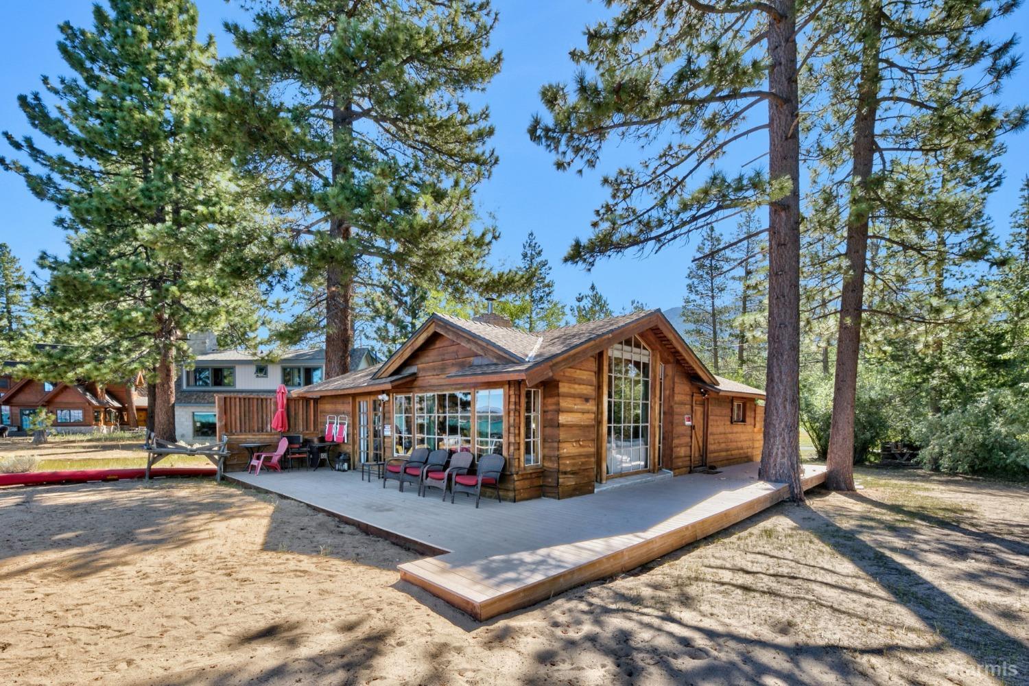 3865 Beach Road South Lake Tahoe, CA 96150 - Photo 9 of 35 a view of house with outdoor seating and yard