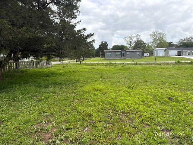 1301 Minglewood Road Liberty, TX 77575 - Photo 6 of 6 a view of a park with large trees