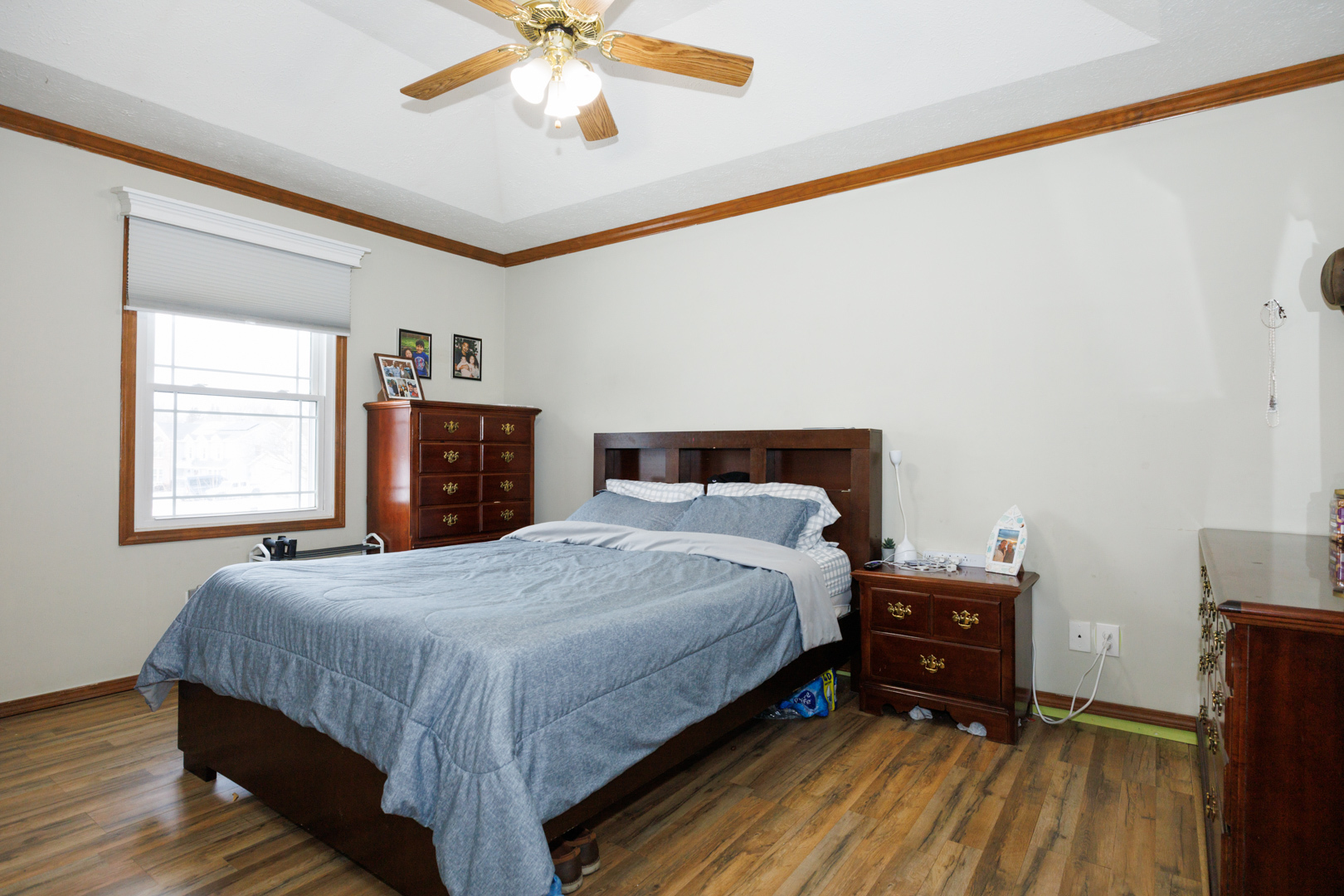 205 North Blair Drive Normal, IL 61761 - Photo 19 of 38 a bedroom with a bed and wooden floor