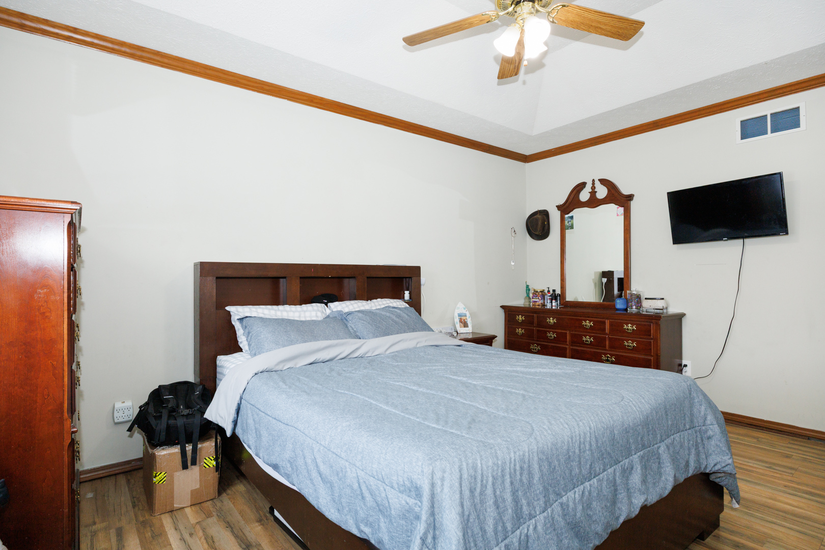 205 North Blair Drive Normal, IL 61761 - Photo 21 of 38 a bedroom with a bed and a flat screen tv