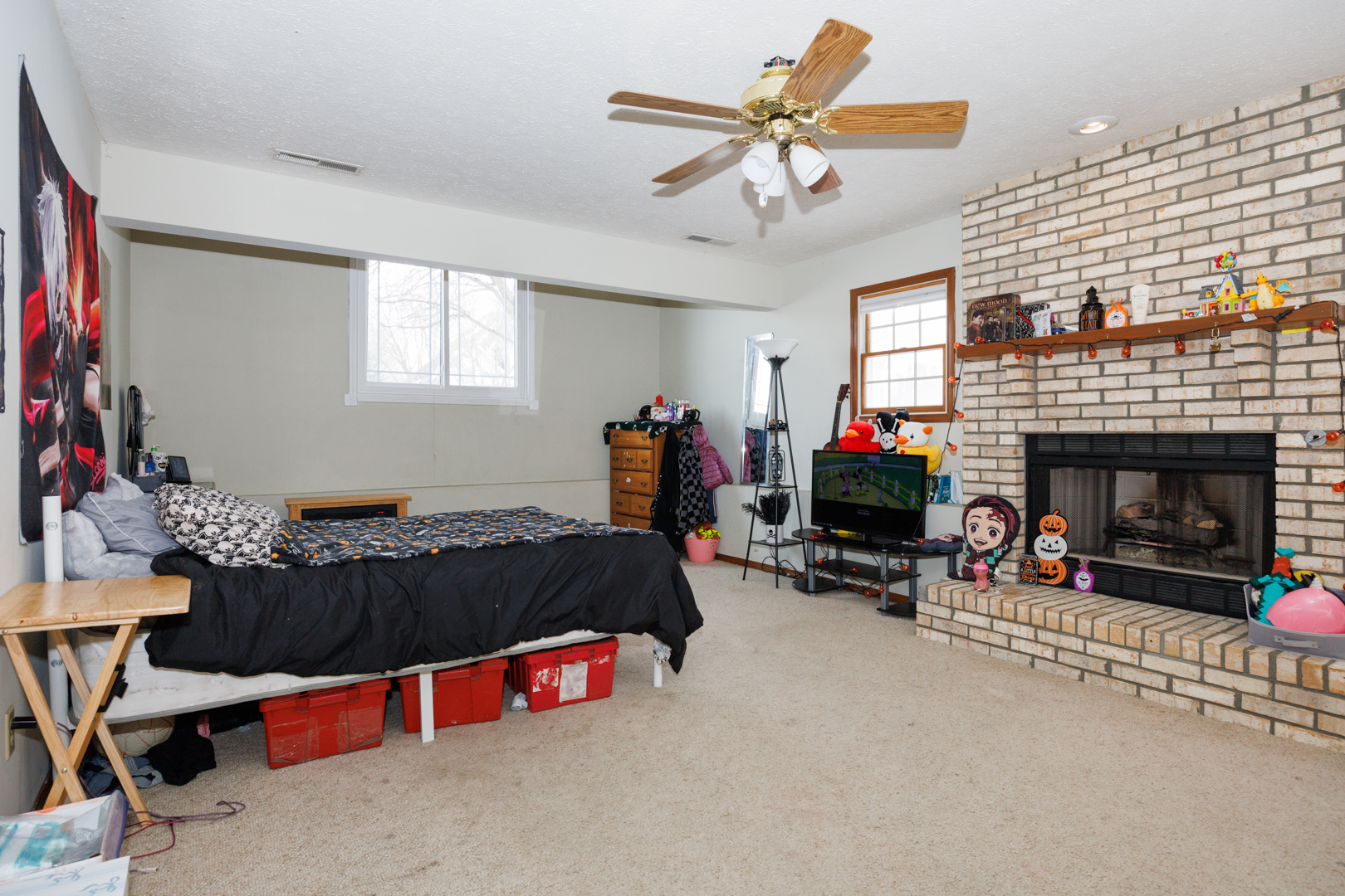 205 North Blair Drive Normal, IL 61761 - Photo 24 of 38 a living room with furniture and a fireplace