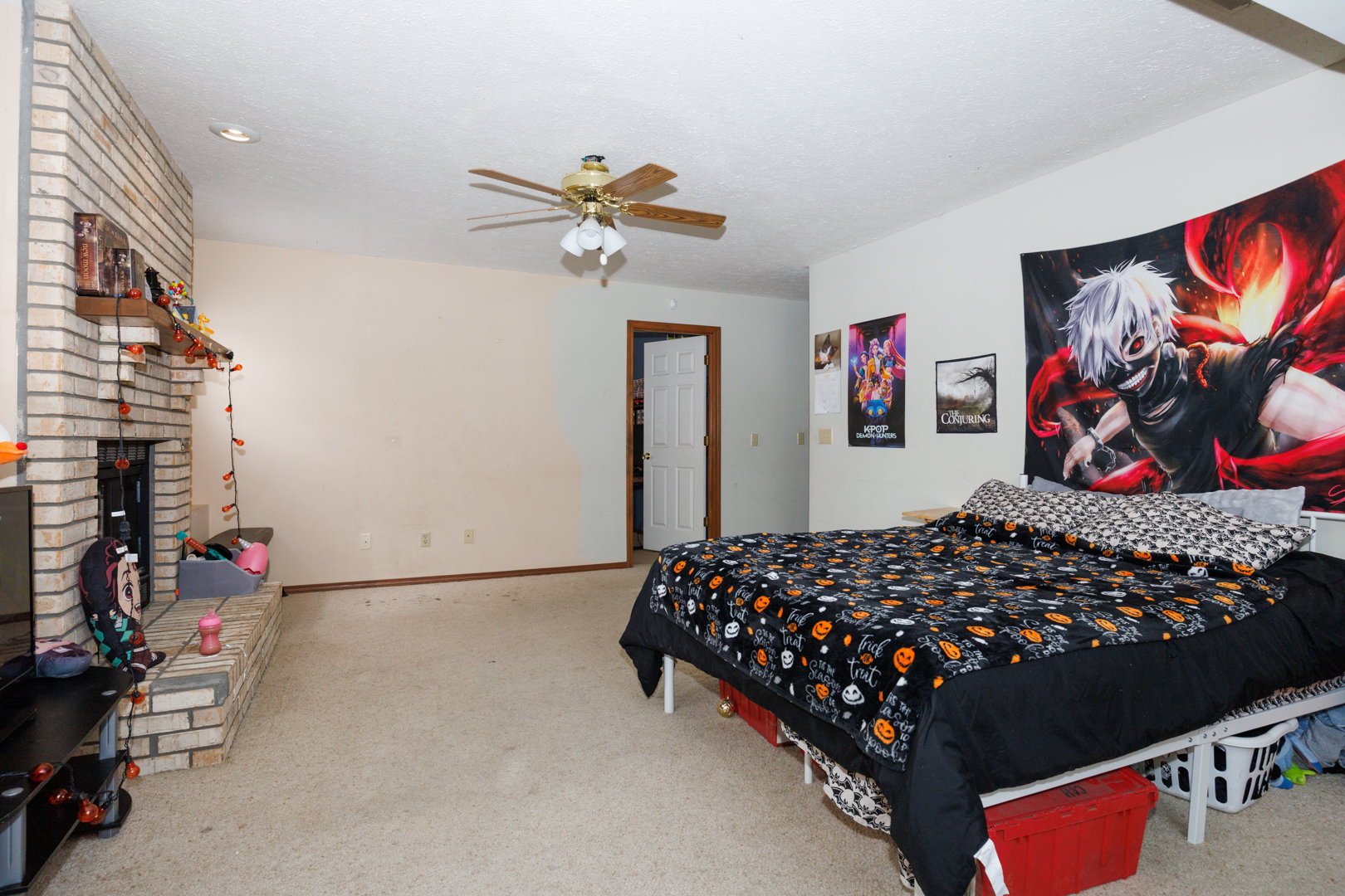 205 North Blair Drive Normal, IL 61761 - Photo 26 of 38 a bedroom with bed and a chandelier