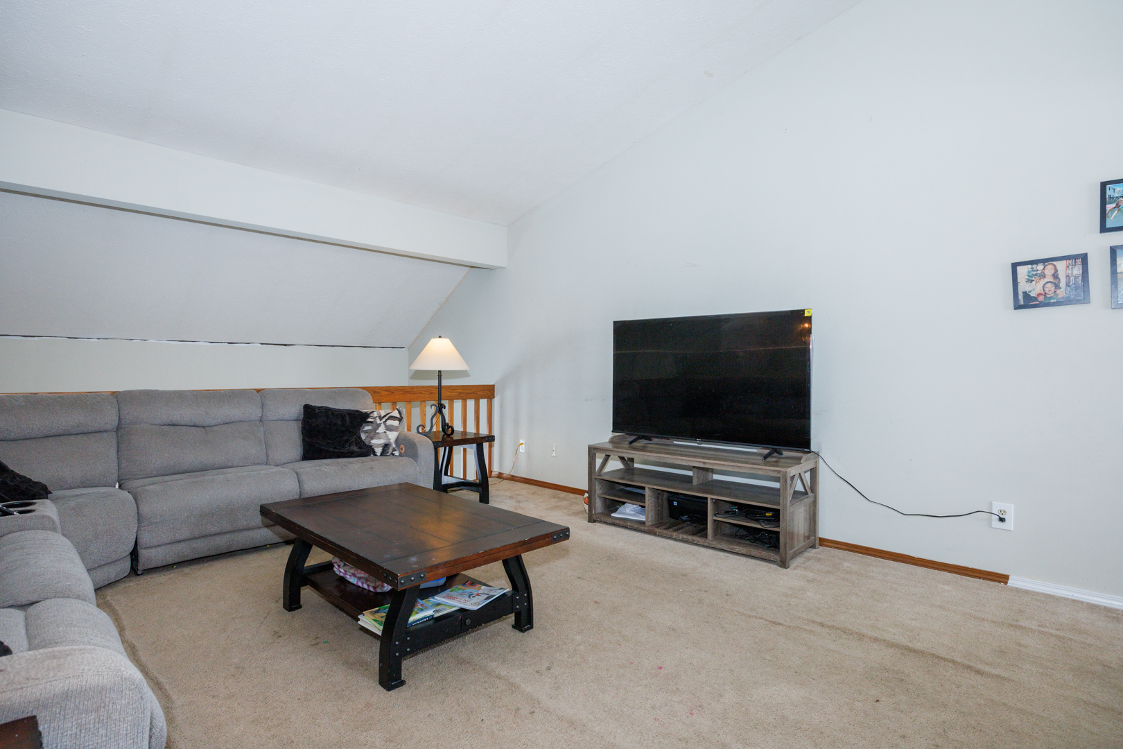 205 North Blair Drive Normal, IL 61761 - Photo 4 of 38 a living room with furniture and a flat screen tv