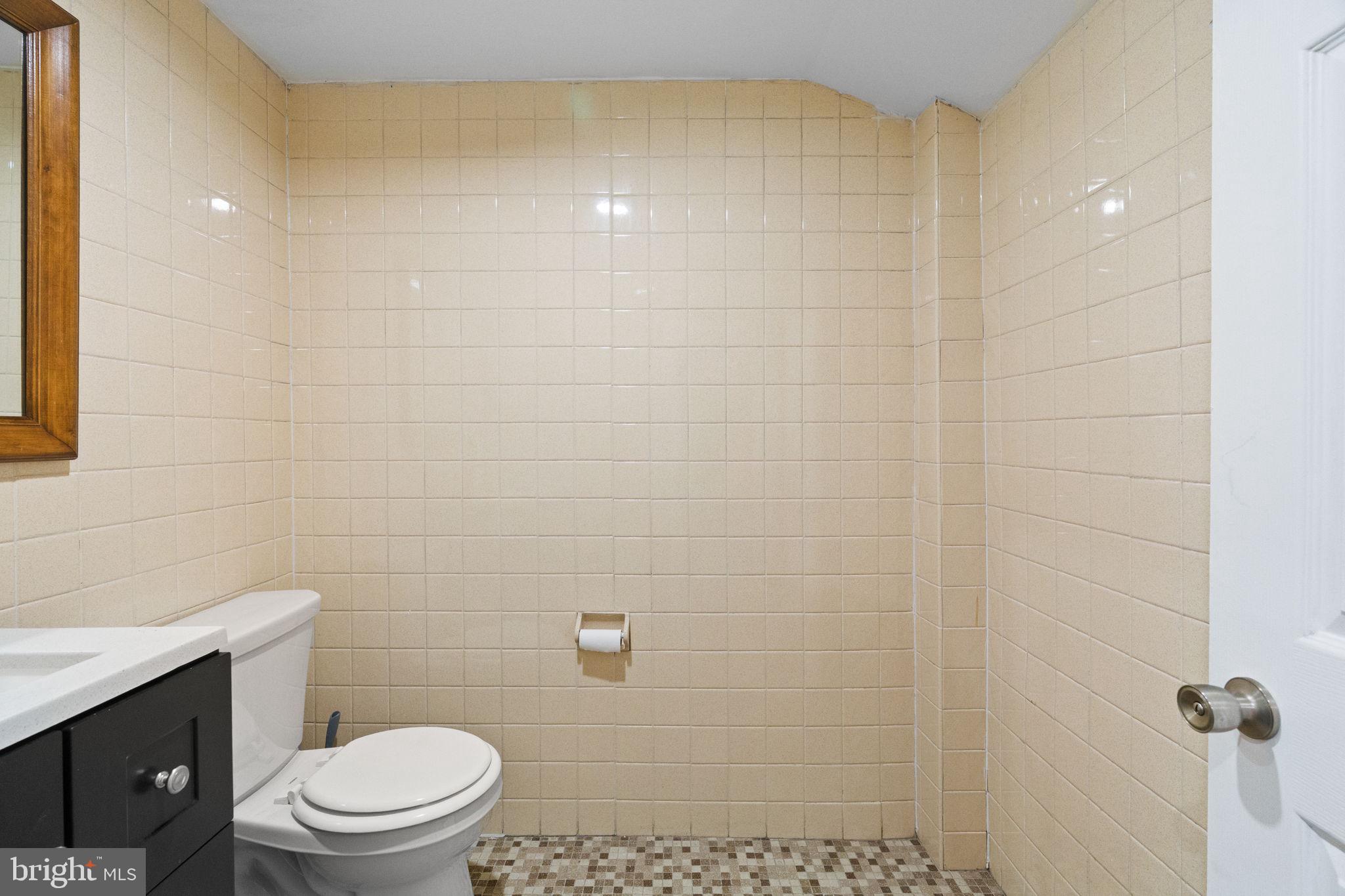 620 George Street Norristown, PA 19401 - Photo 22 of 53 a bathroom with a toilet and a sink