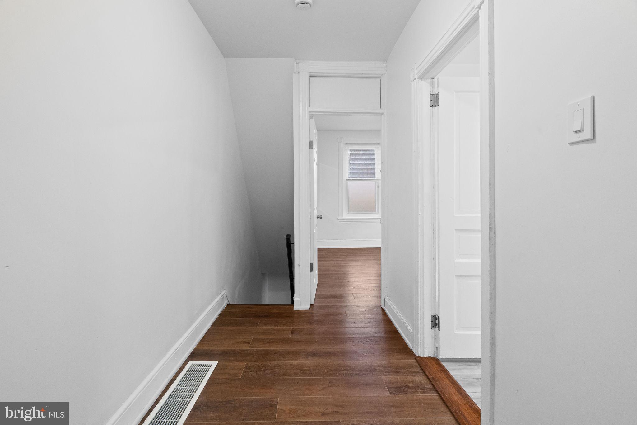 620 George Street Norristown, PA 19401 - Photo 23 of 53 a view of a hallway with wooden floor