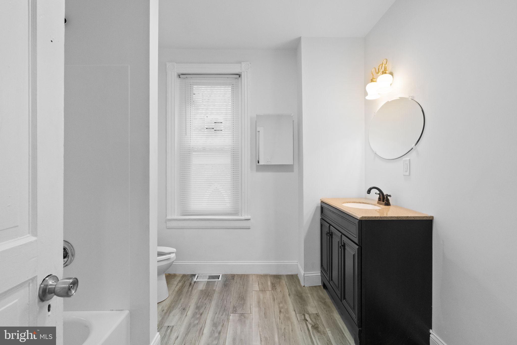 620 George Street Norristown, PA 19401 - Photo 29 of 53 a bathroom with a sink and a mirror