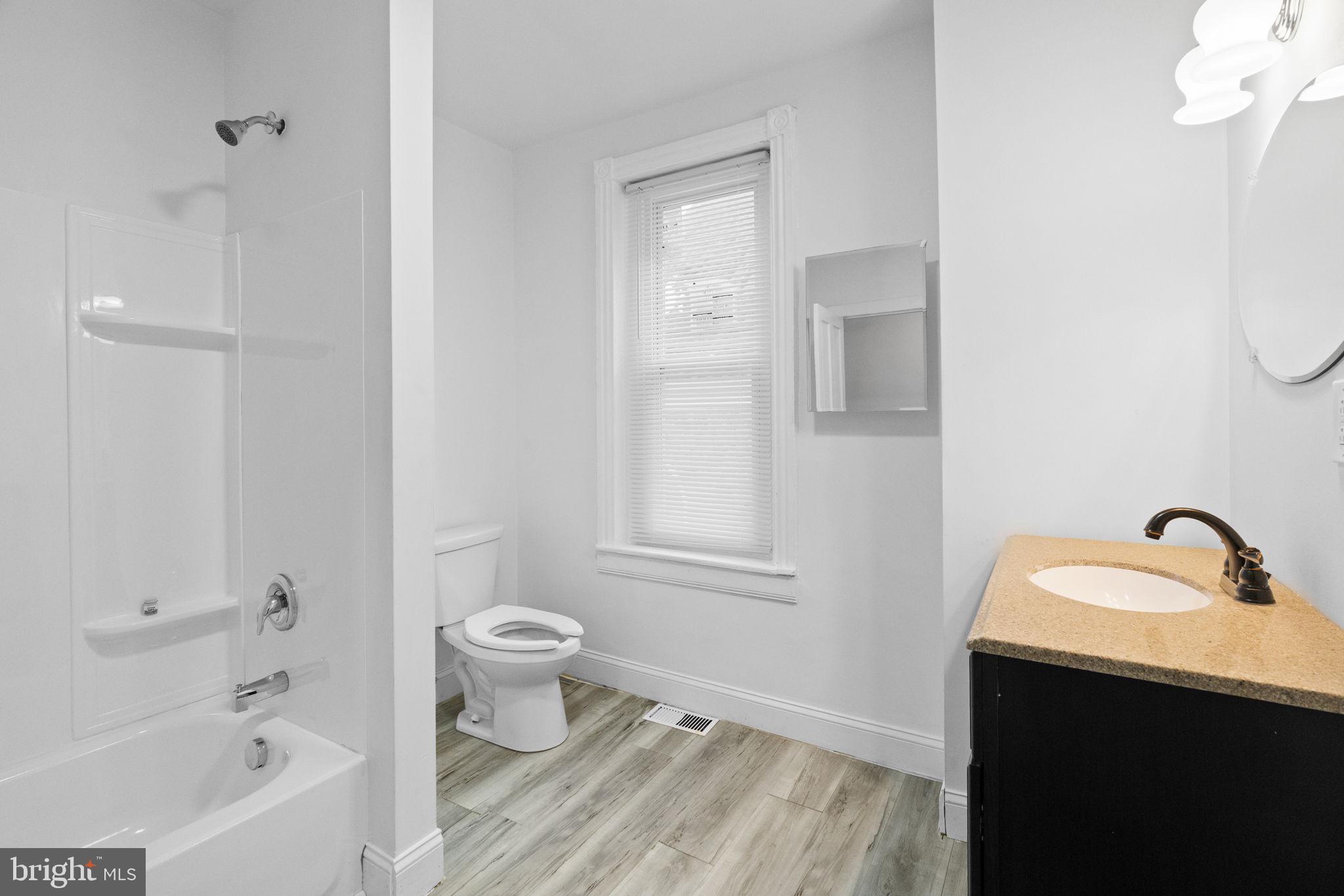 620 George Street Norristown, PA 19401 - Photo 30 of 53 a bathroom with a sink toilet and shower