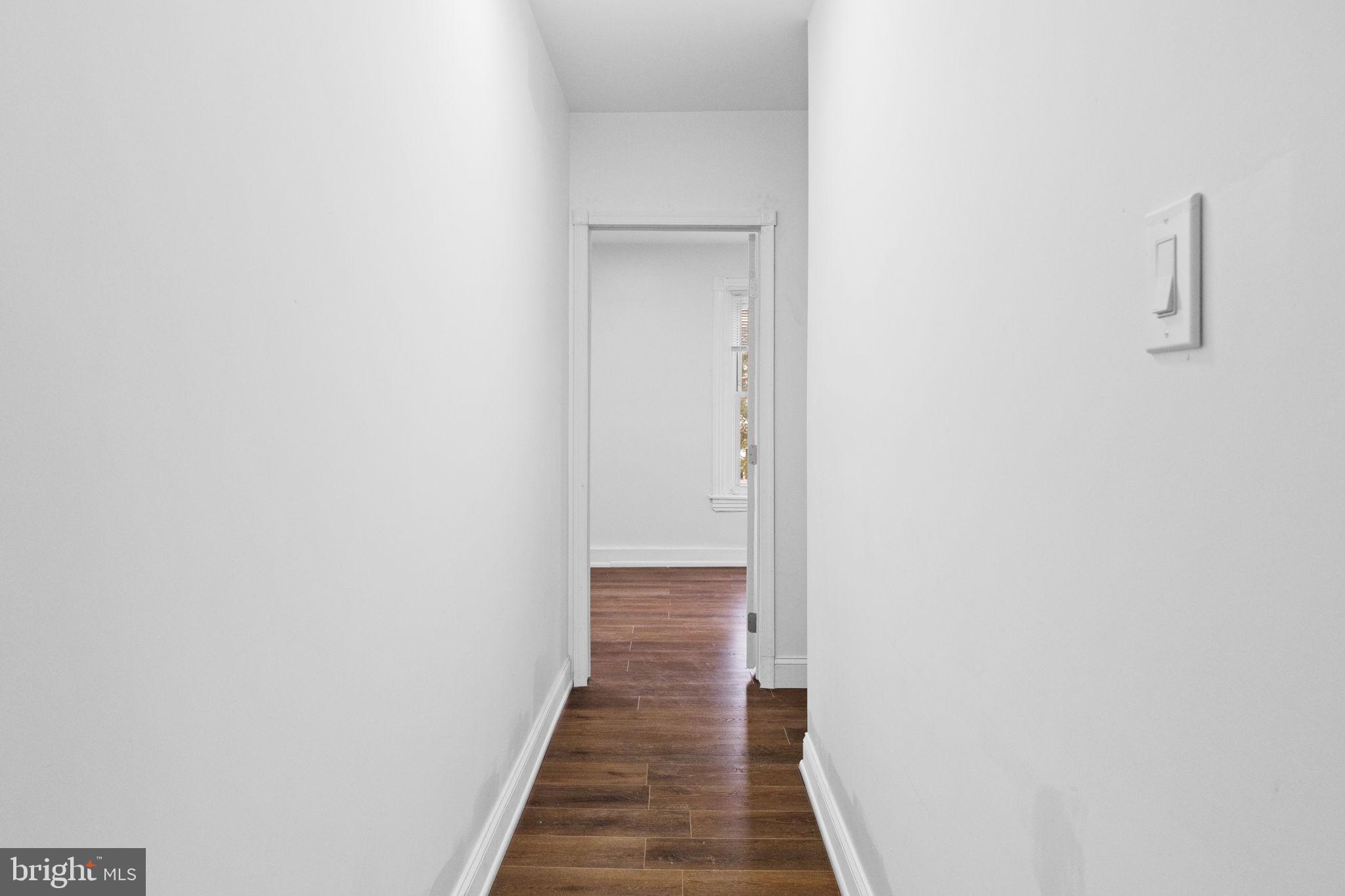 620 George Street Norristown, PA 19401 - Photo 32 of 53 a view of a hallway with wooden floor