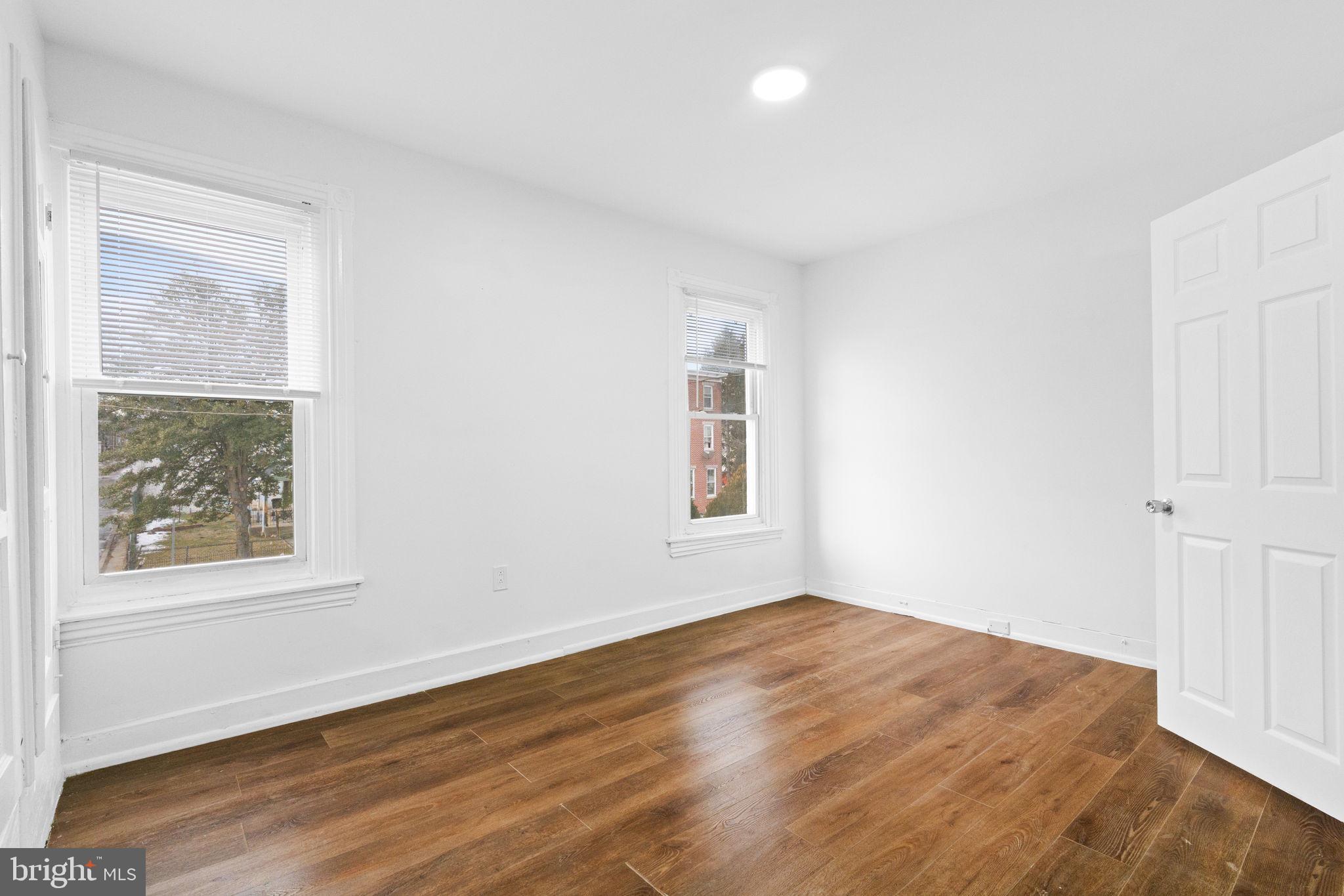 620 George Street Norristown, PA 19401 - Photo 38 of 53 a view of empty room with wooden floor and fan