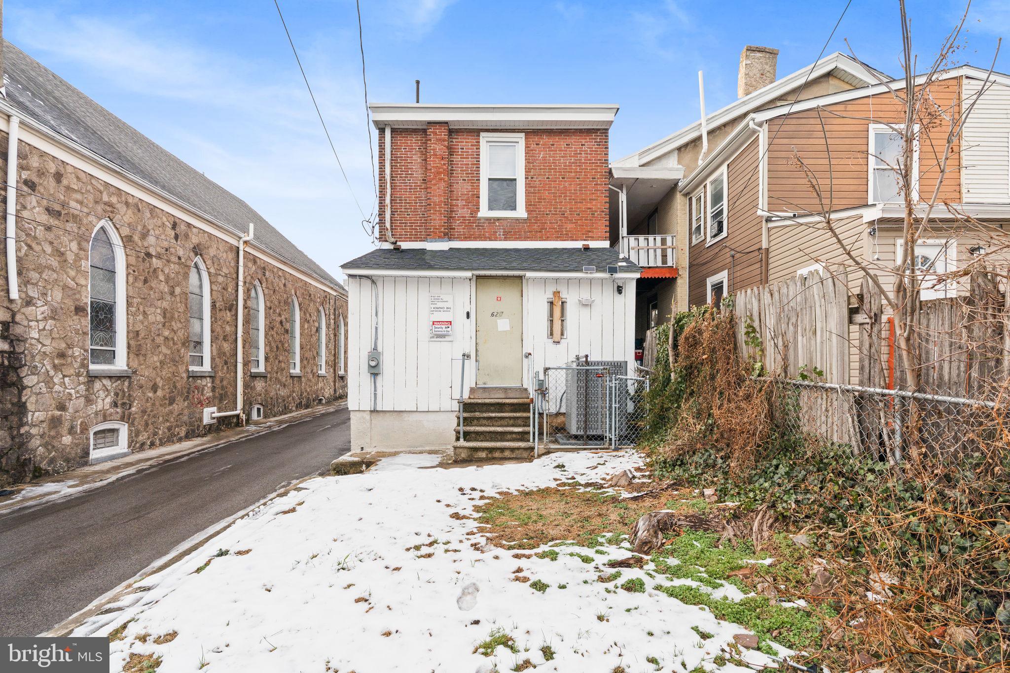 620 George Street Norristown, PA 19401 - Photo 52 of 53 a front view of a house with a yard