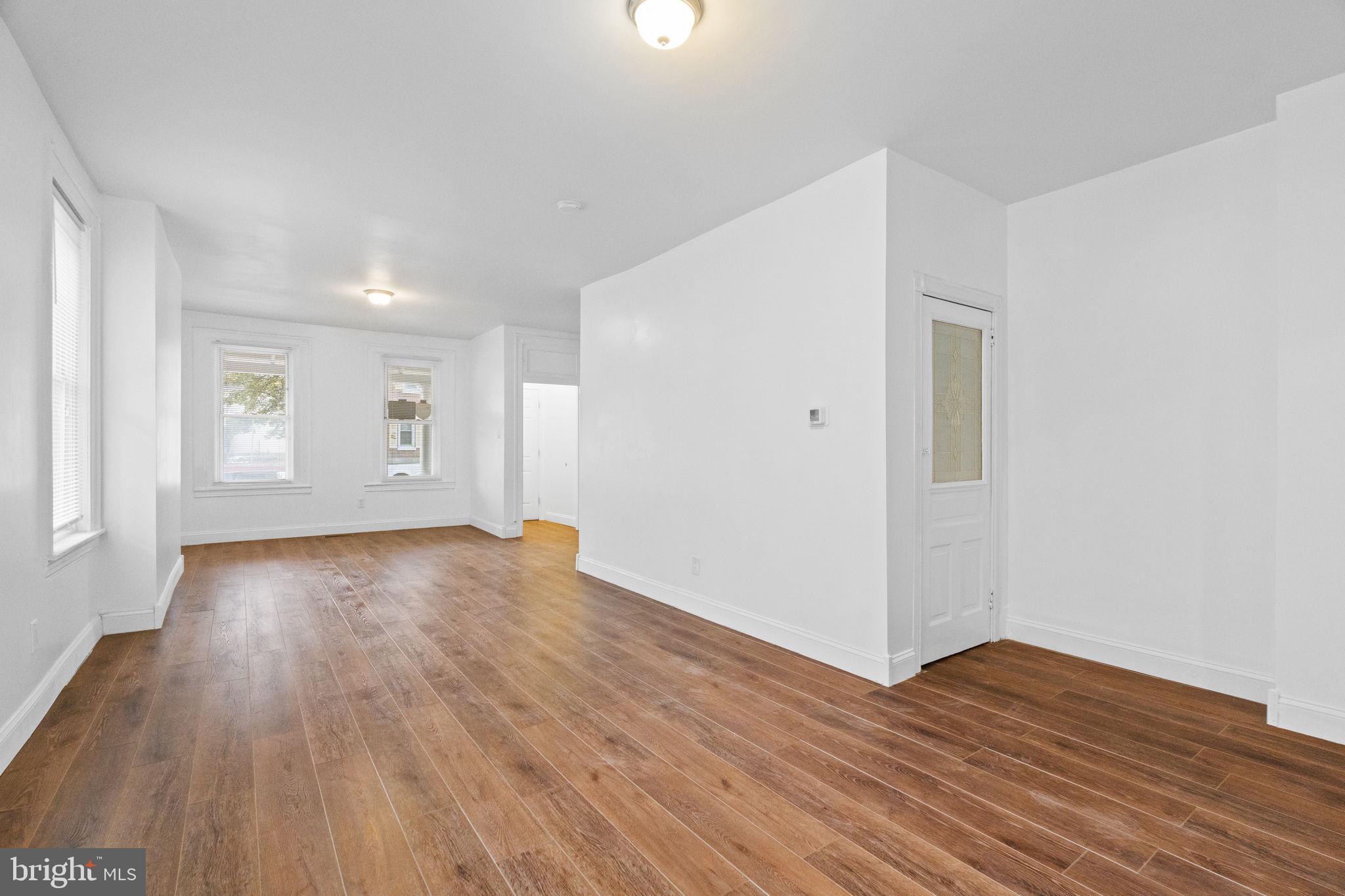 620 George Street Norristown, PA 19401 - Photo 10 of 53 an empty room with wooden floor and windows