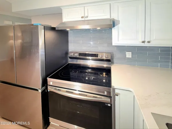 a kitchen with a sink and a window