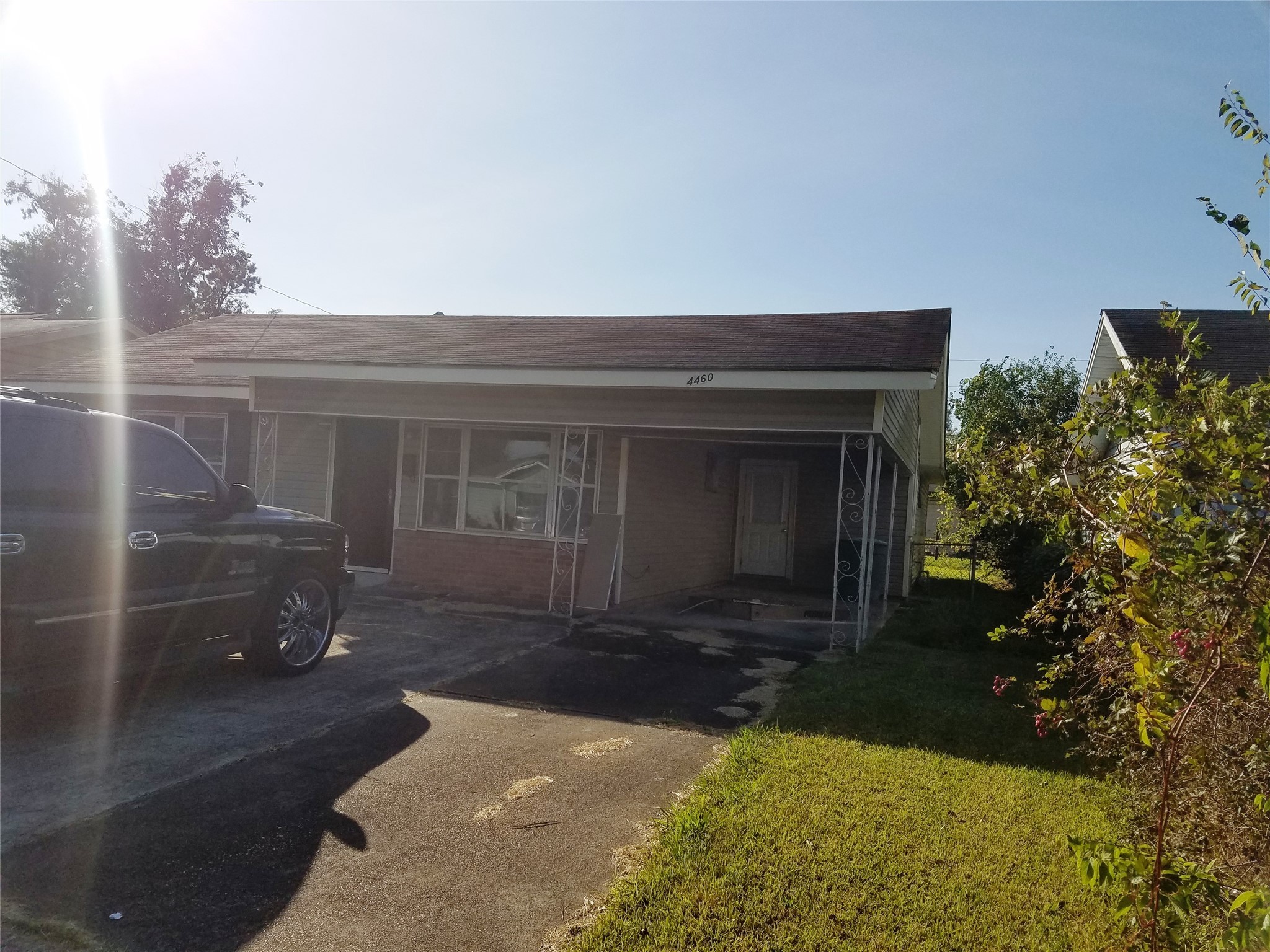 a front view of a house with yard