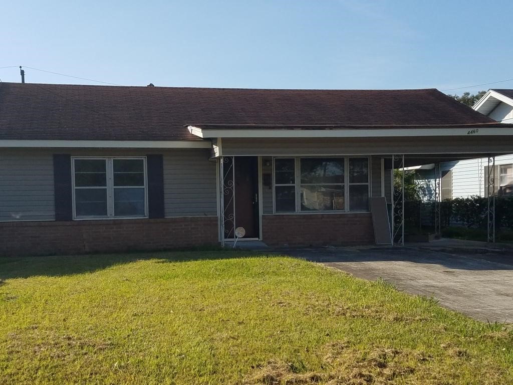 4460 South 5th Street Beaumont, TX 77705 - Photo 6 of 6 a view of house with yard and outdoor seating