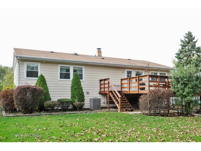 439 Weidner Road Buffalo Grove, IL 60089 - Photo 22 of 23 a view of a house with a backyard