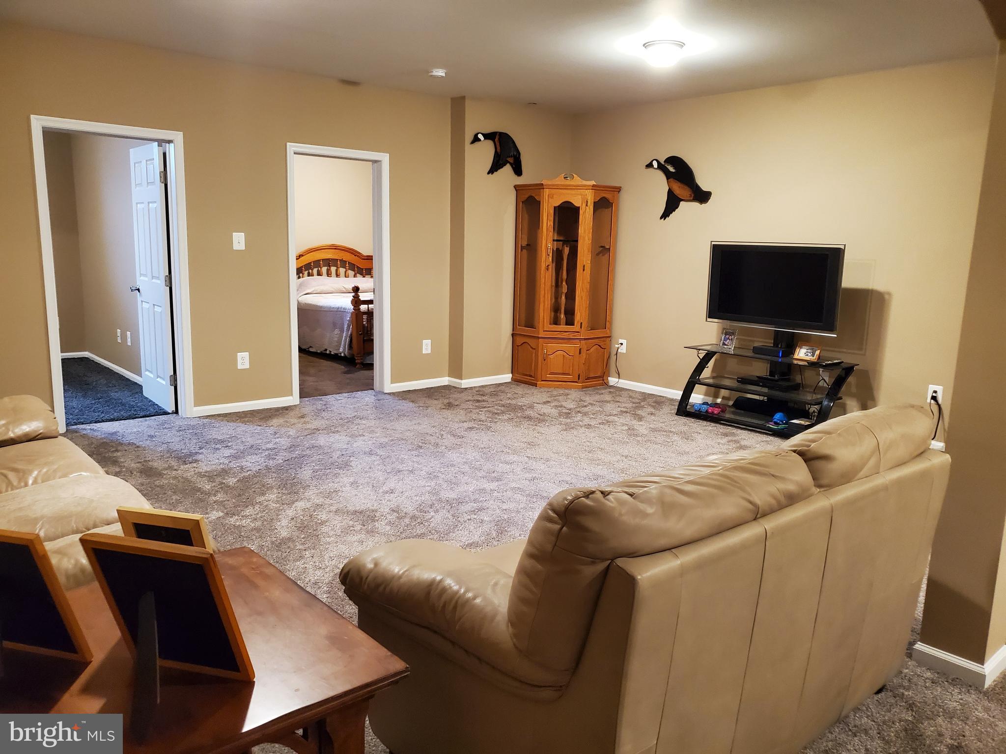 7520 Broomes Island Road St. Leonard, MD 20685 - Photo 28 of 35 Another view of lower level recreation room