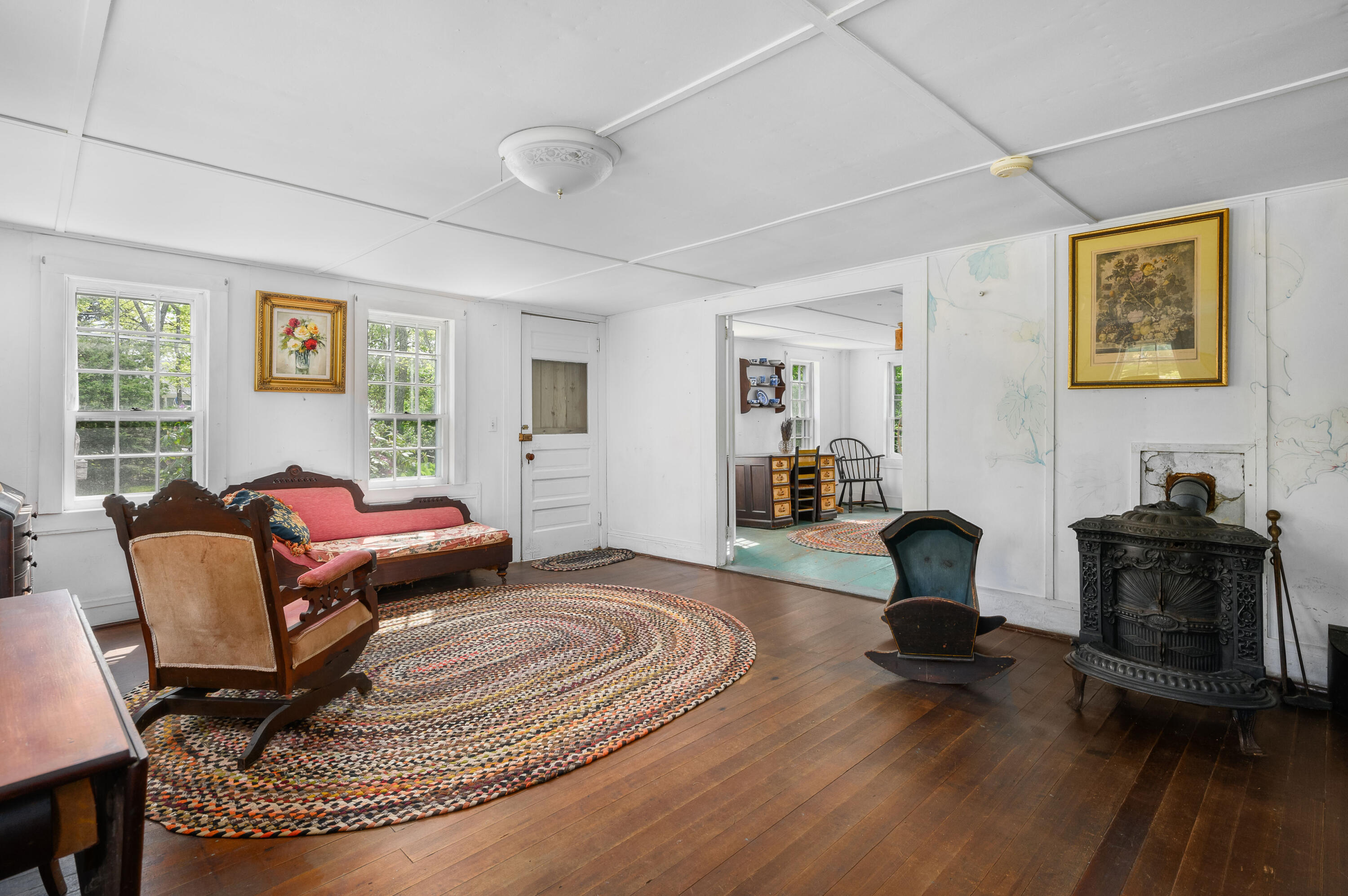 75 Massasoit Road Eastham, MA 02642 - Photo 22 of 49 a living room with furniture and a fireplace