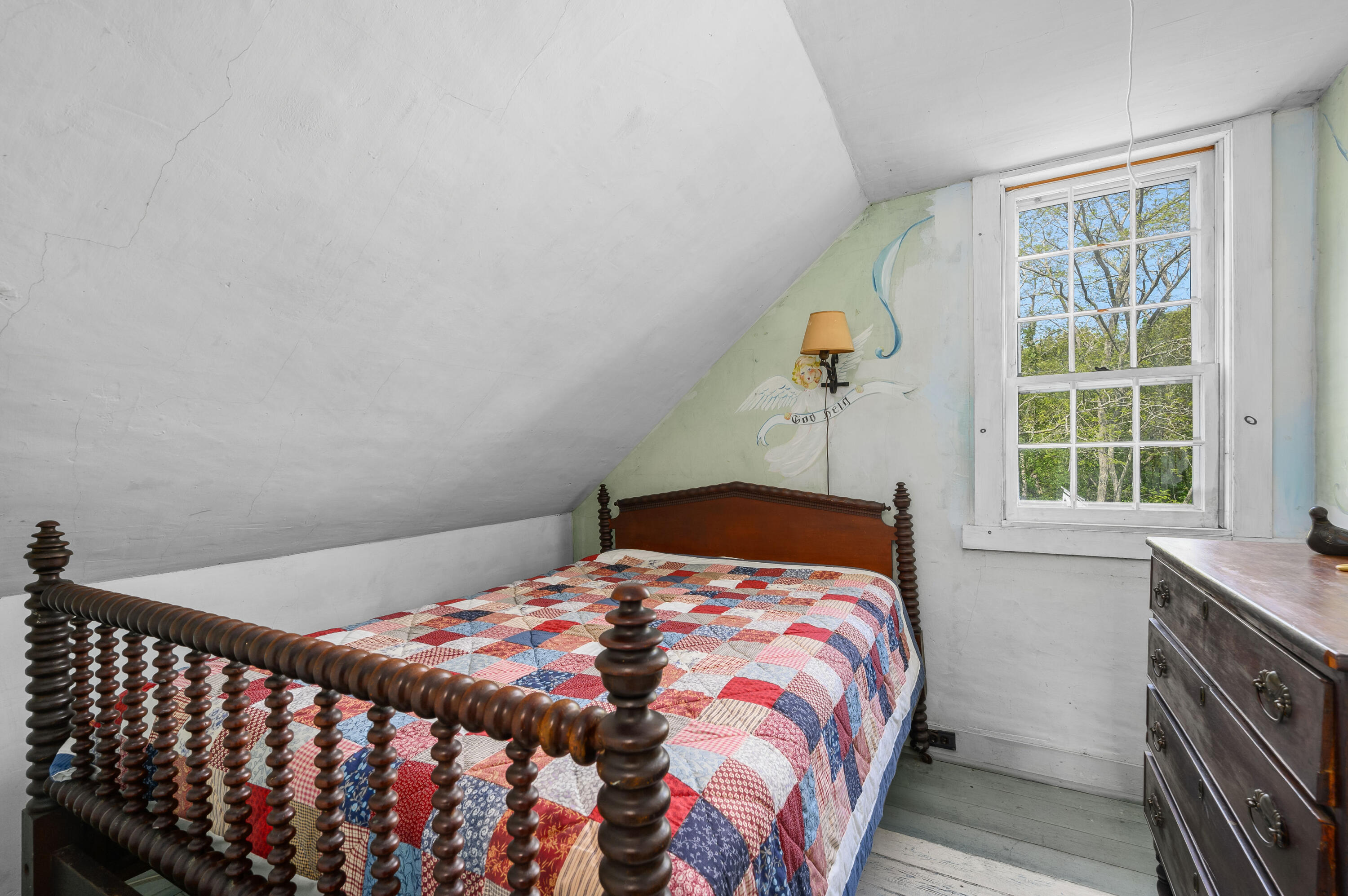 75 Massasoit Road Eastham, MA 02642 - Photo 25 of 49 a bedroom with a bed and a window