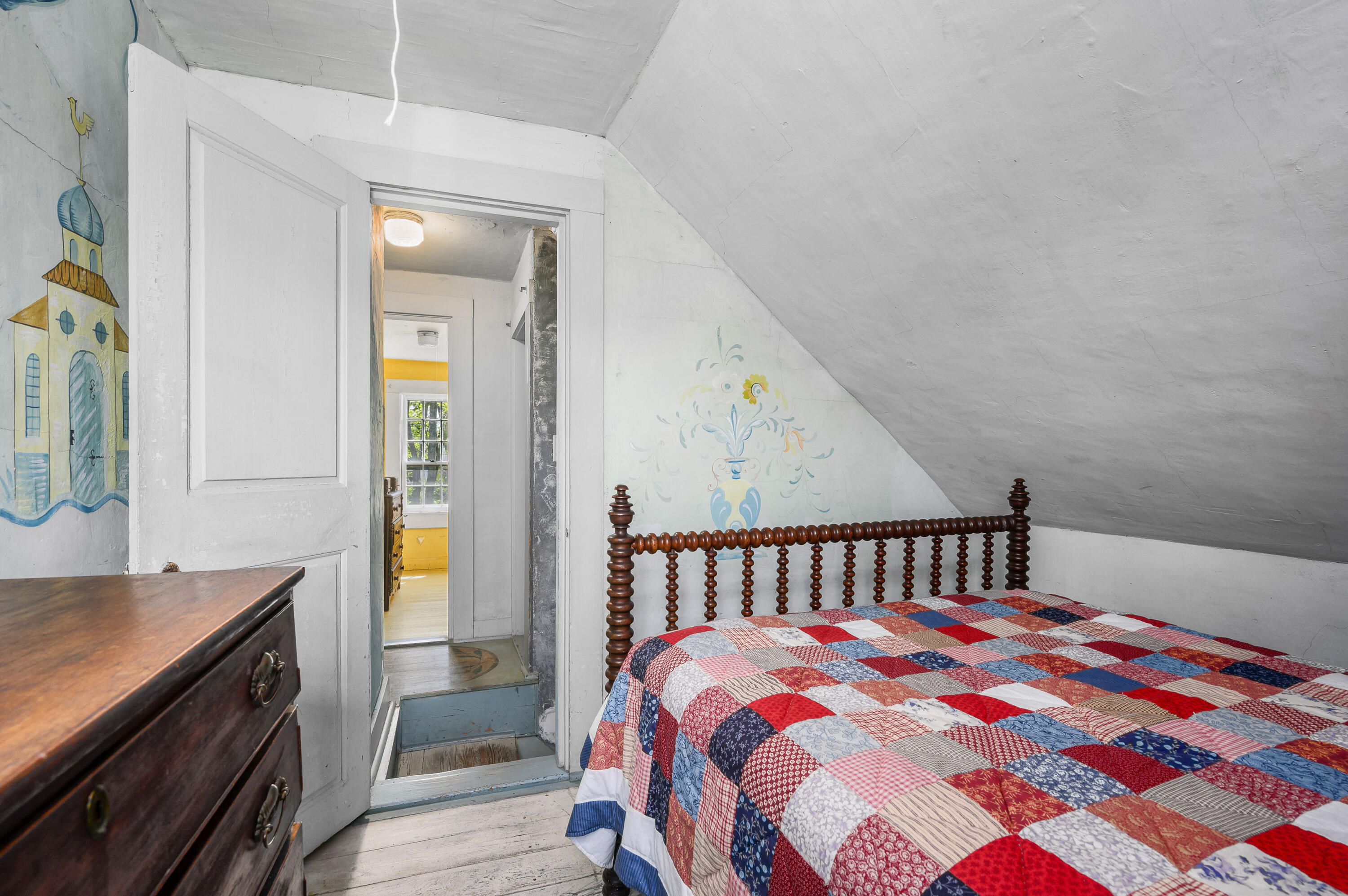 75 Massasoit Road Eastham, MA 02642 - Photo 26 of 49 a bedroom with a bed and a table in it